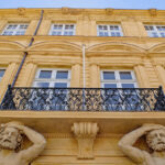 Image of a beautiful building from Aix en Provence, with its characteristic yellow colour