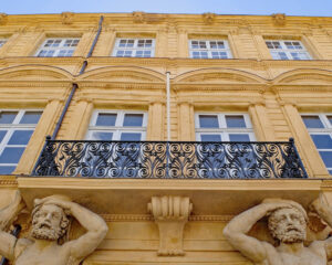 Image of a beautiful building from Aix en Provence, with its characteristic yellow colour