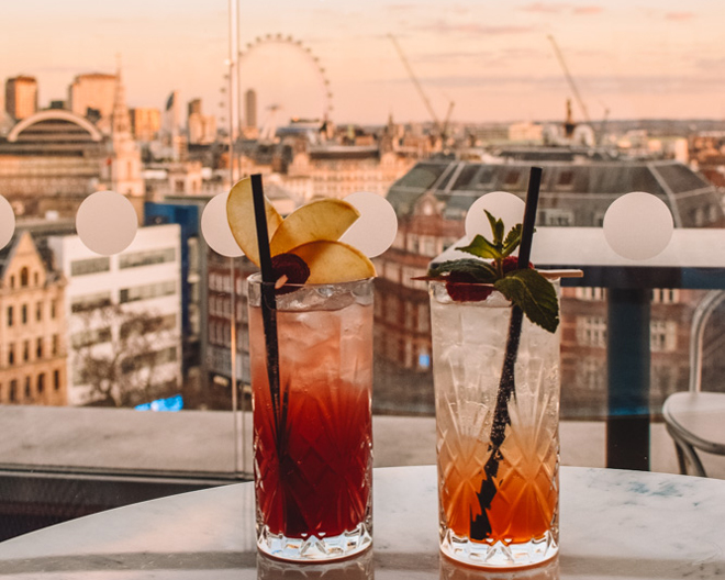 cocktails at sunset in london on the rooftop
